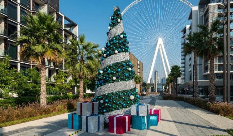 Christmas tree on background Dubai Eye on Bluewaters Island